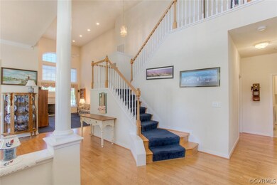 Foyer Looking into Formal Dining Room & Living Roo
