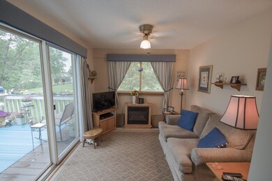 Four season porch with patio doors to a deck - gre