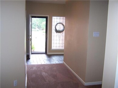 Entry hall to den.