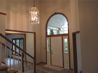 Two story entry with lots of natural lighting.