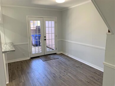 French doors open to the patio area and also the k