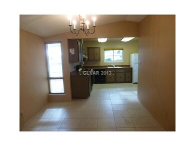 Property Photo. Looking from dining area to kitche