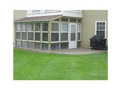 Exterior Back. Exterior view of Sun room with atta