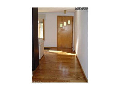 Front foyer entry with real natural oak flooring