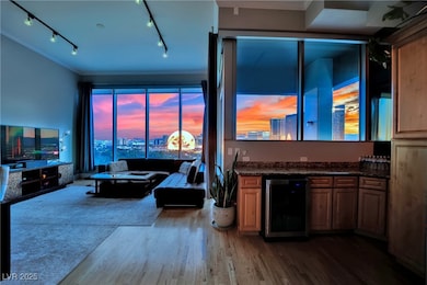 Living area with beverage cooler, wood finished fl