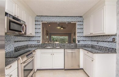 613 Squire Cir unit 202, Naples, FL 34104 - photo 7