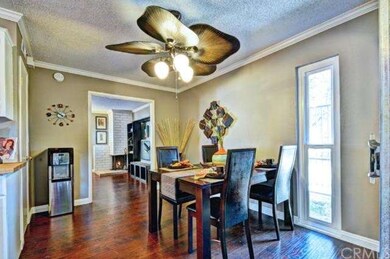 Formal Dining area with gorgeous ceiling fan! 