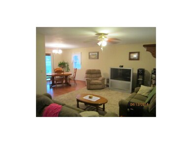 Living room flows into dining area