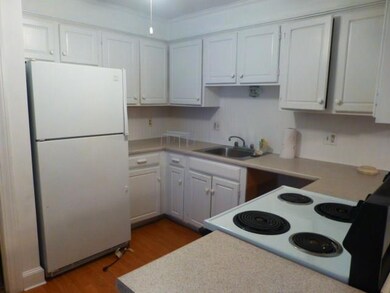 KITCHEN HAS PLENTY OF CABINETS & IS...