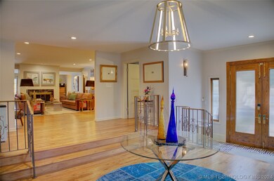 The entry is spacious enough to have an office or