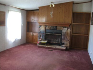 Family Room. The family room has a wood burning fi
