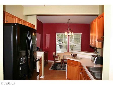 Kitchen - The kitchen features sleek black applian