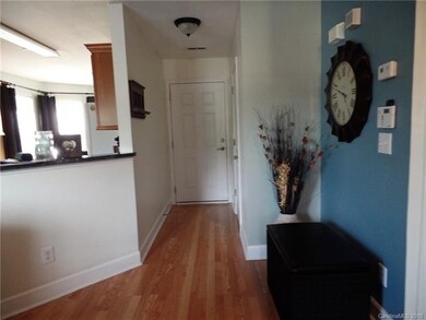 Entry hall greet you inside front door.  Laminate 