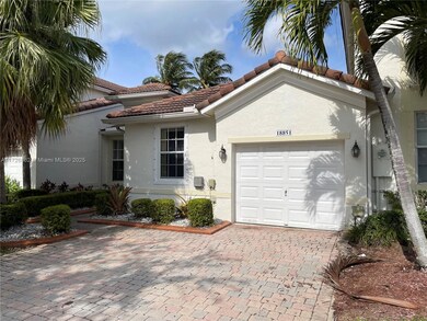Front of the house & 2 cars driveway