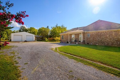 30x40 detached propane heated garage/shop with 30 x 10 hobby room heated & cooled. 200 Amp, 50 & 30 Amp RV connection, 60 Amp Welding connection