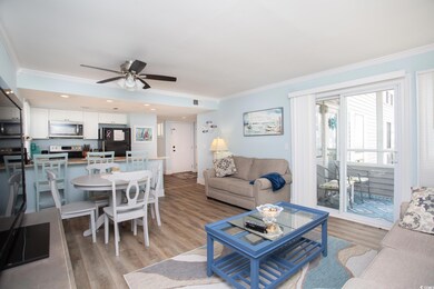 Living room with light hardwood / wood-style floor