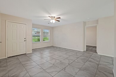 Step into the spacious living area, featuring abun