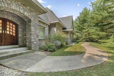 Smart features like security cameras, recessed soffit lighting, and a Ring doorbell bring peace of mind.