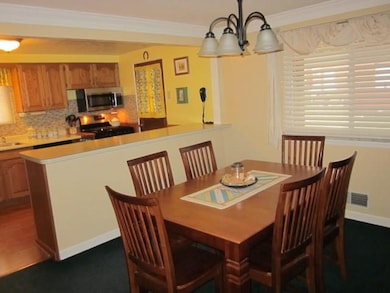 You'll never feel cramped in this Dining Room!  Th