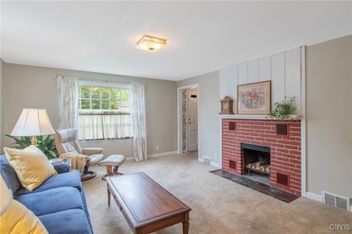 Foyer has a guest closet.  Wood burning fireplace.