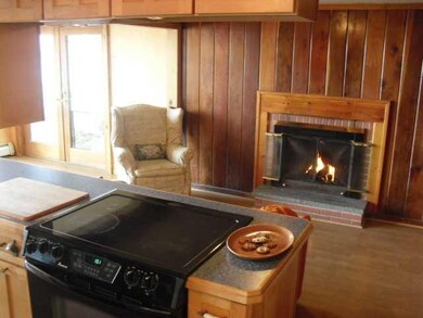 Exterior Front kitchen overlooks living and dining
