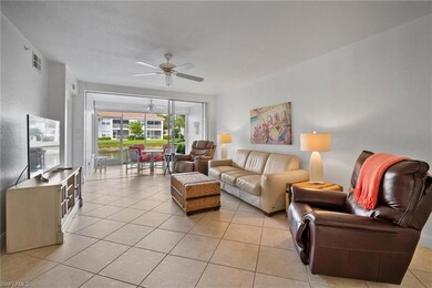 Tiled living room with ceiling fan