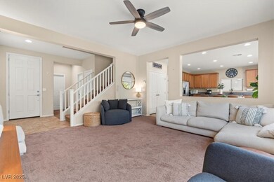 Living room featuring recessed lighting, stairs, l