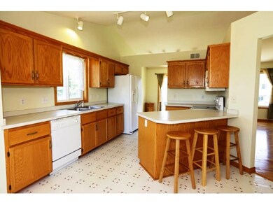 Nice kitchen with breakfast bar.