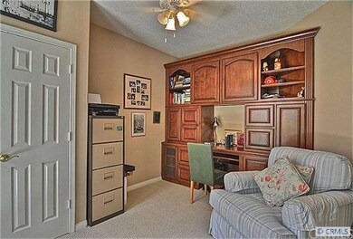 Downstairs Bedroom upon entering, opens to courtya