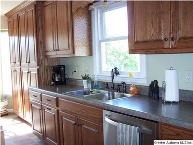 Custom wood cabinets with pantry!