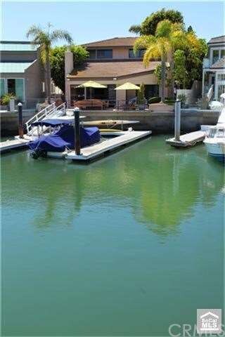 Bayfront property with large boat slip and side sl