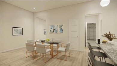 Dining area featuring baseboards and light wood-st