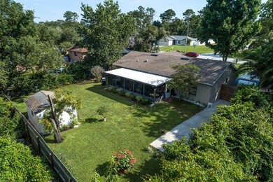 Rear view of fenced in back yard.