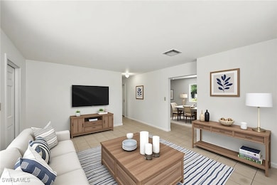 Living room featuring tile flooring