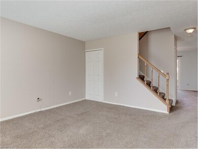 view of the other side of the living room, stairs 