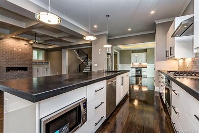 The Kitchen opens up to the living room as well as