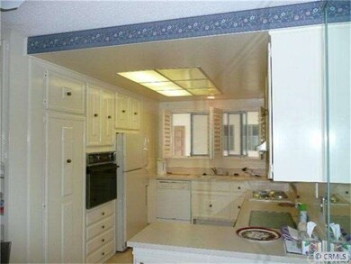 kitchen with refrigerator and oven