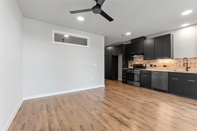 Kitchen featuring appliances with stainless steel
