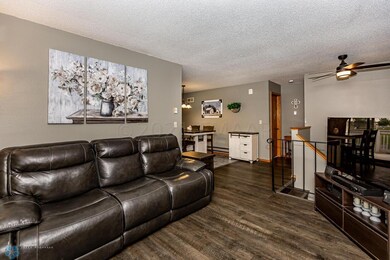 View of living room to dining/hallway