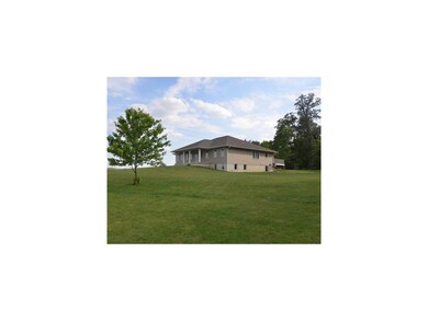 Front Exterior. Situated on nearly 4 acres.  Lower