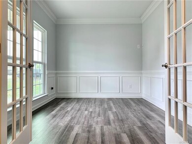 Sunny office off of main entry hallway