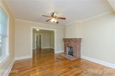 Living room with ceiling fan and nice hardwood floors