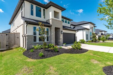 Like new, this home contains gutters all the way a