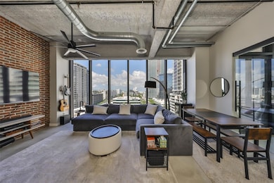 2. Floor to Ceiling Windows Capture Scenic Downtown Views