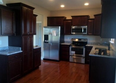 Gourmet kitchen with top of the line SS appliances