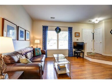 Living room has 9 ft ceilings, 2 bright windows, f