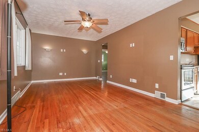 293 Thelma Dr, Sheffield Lake, OH 44054 - photo 2