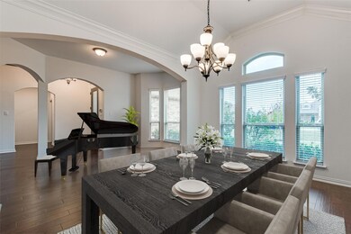 Virtually staged dining area and sitting area at e