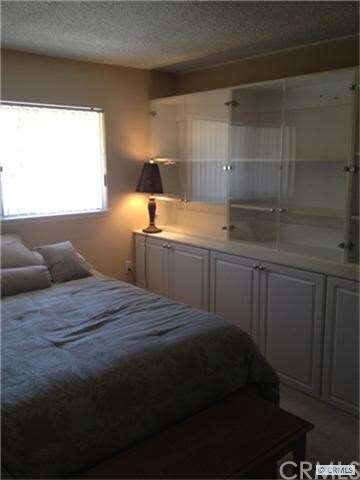 Master bedroom custom storage units.