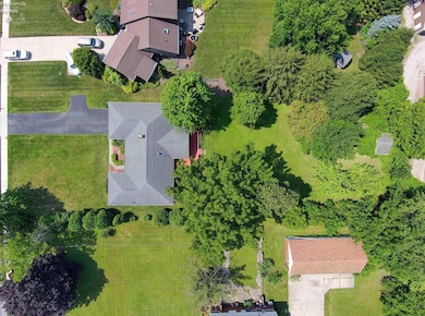 Drone view of the property, big back yard.